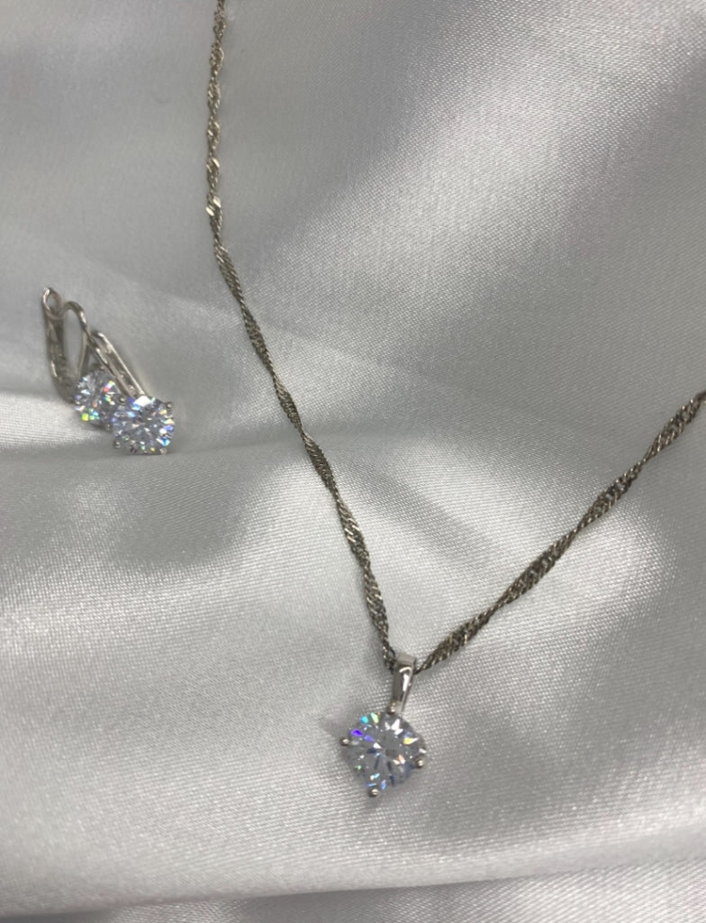 set circular de topacio blanco