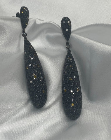 aretes onix con piedras de colores